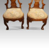 Pair of George I walnut side chairs embroidered seats