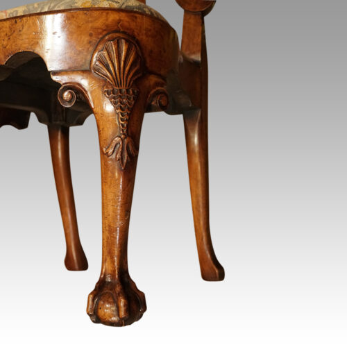 Pair of George I walnut side chairs front leg