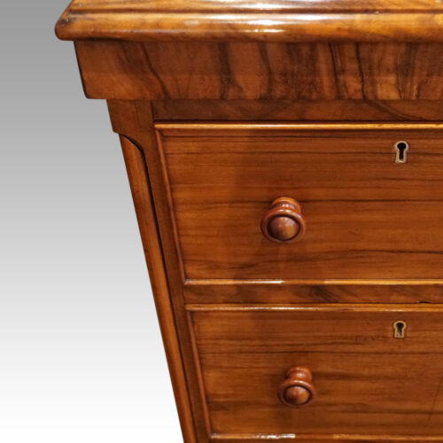 Pair of Victorian walnut bedside chests drawer detail