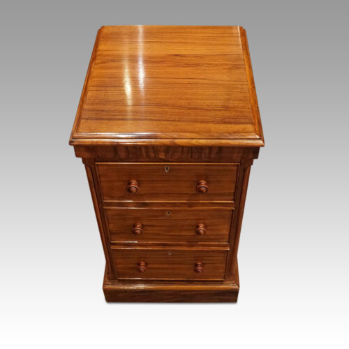 Pair of Victorian walnut bedside chests top