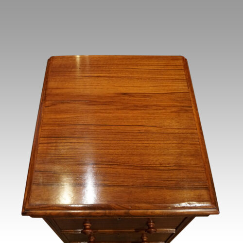 Pair of Victorian walnut bedside chests top detail