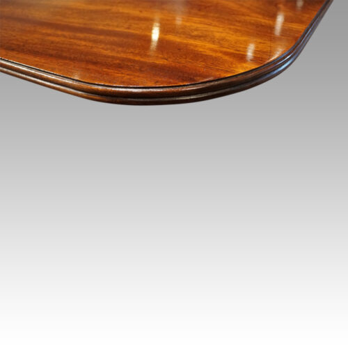 Regency style mahogany dining table edge