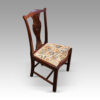 Set of 12 Georgian mahogany dining chairs angle
