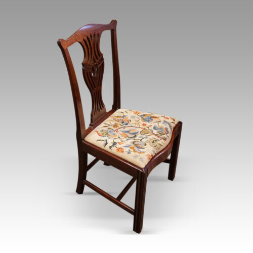 Set of 12 Georgian mahogany dining chairs angle