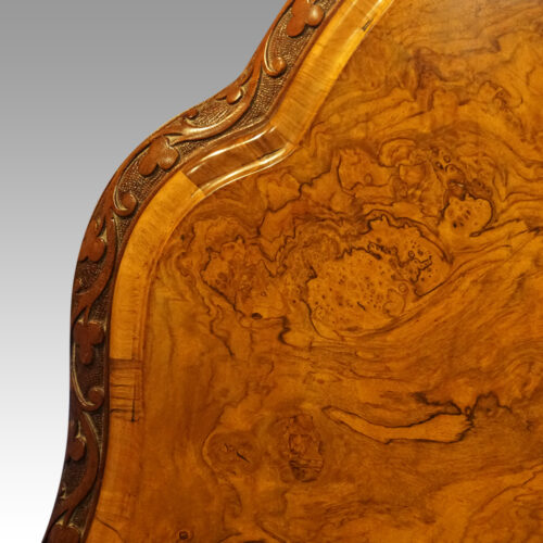 Victorian shaped walnut loo table banded edge