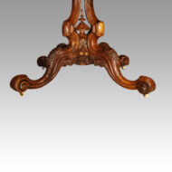 Victorian shaped walnut loo table base detail