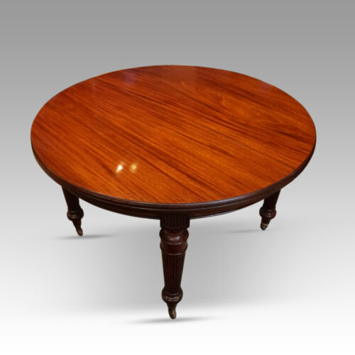 Edwardian circular extending dining table closed