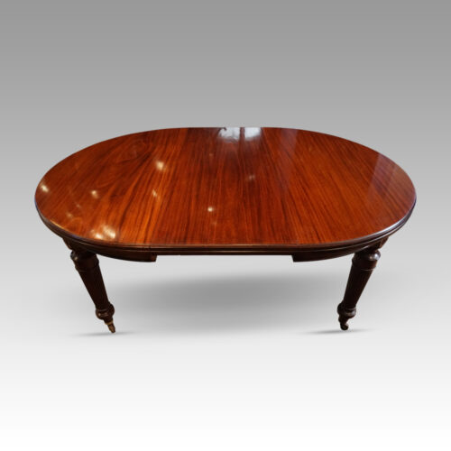 Edwardian circular extending dining table one leaf