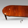 Edwardian circular extending dining table round end