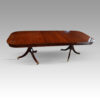 George VI mahogany extending pillar table one leaf