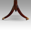 George VI mahogany extending pillar table splay