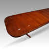 George VI mahogany extending dining table top corner