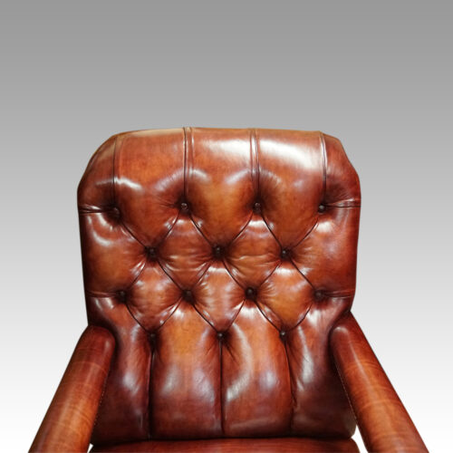 Victorian red leather easy chair button back