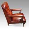 Victorian red leather easy chair side