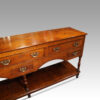 Antique oak pot board dresser at angle