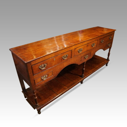 Antique oak pot board dresser front angle