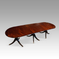 Regency style mahogany small triple pillar table