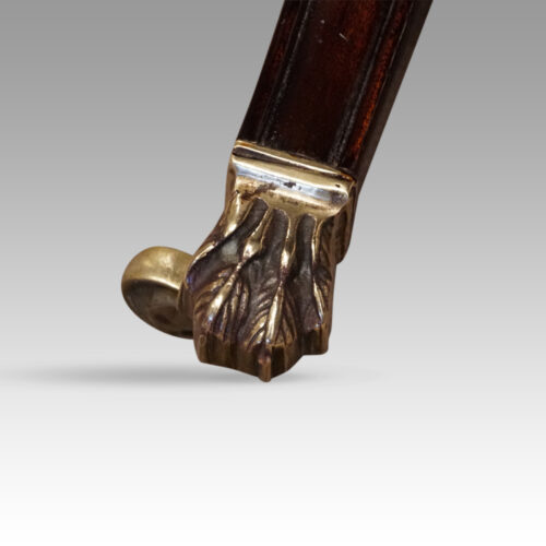 Regency style mahogany small triple pillar table claw feet