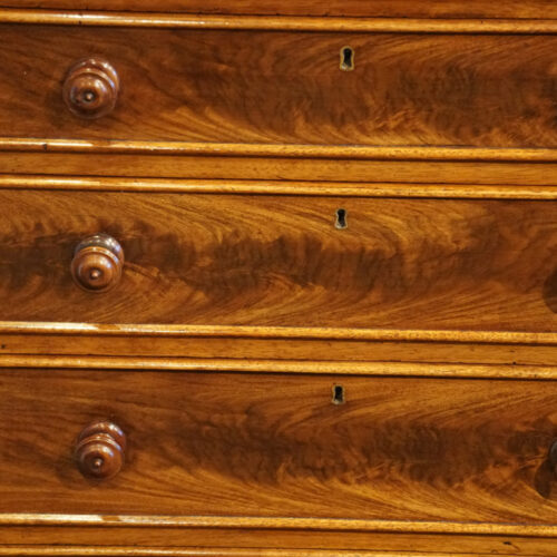 William IV mahogany Channel Island chest drawer front
