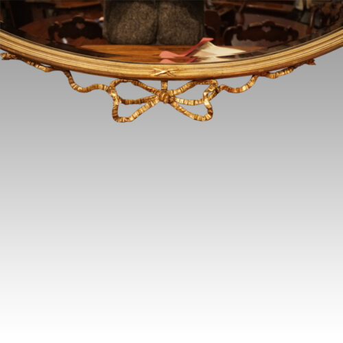 Antique gilt mirror with Wedgwood plaque ribbon