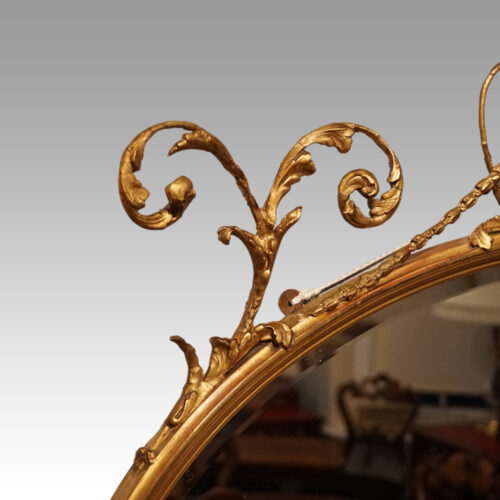 Antique gilt mirror with Wedgwood plaque shoulder