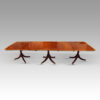 George V mahogany triple pillar dining table