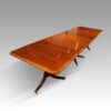 George V mahogany triple pillar dining table angle
