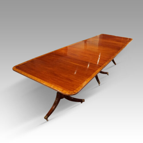 George V mahogany triple pillar dining table angle
