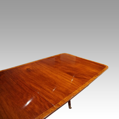 George V mahogany triple pillar dining table end