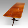 George V mahogany triple pillar dining table length view