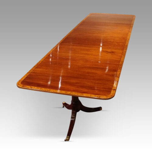 George V mahogany triple pillar dining table length view