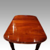 Victorian mahogany extending dining table end view