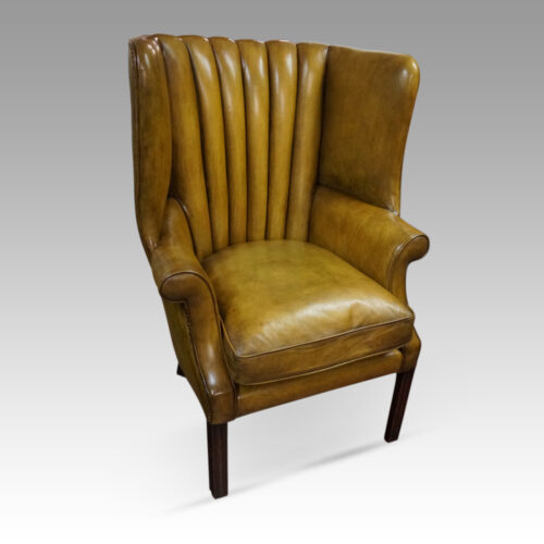 19thc. barrel back wing chair front angle