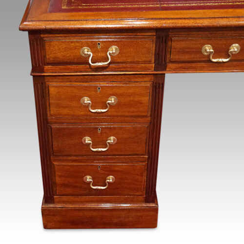 Edwardian mahogany pedestal desk drawer fronts