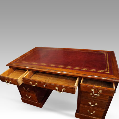 Edwardian mahogany pedestal desk top drawers