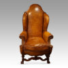 Pair of walnut leather wing chairs single chair