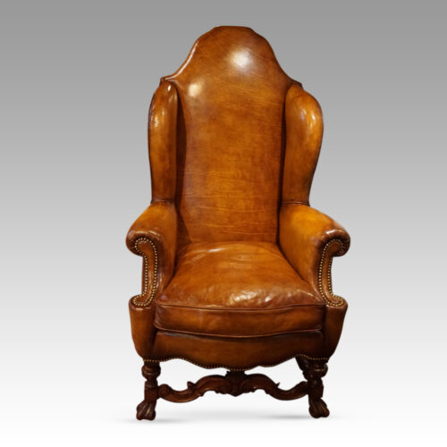 Pair of walnut leather wing chairs single chair