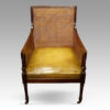 Regency mahogany bergere library chair front