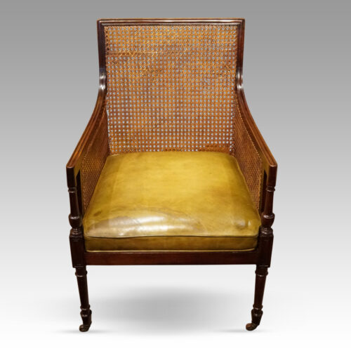 Regency mahogany bergere library chair front