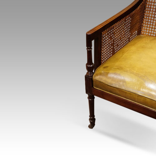Regency mahogany bergere library chair front corner