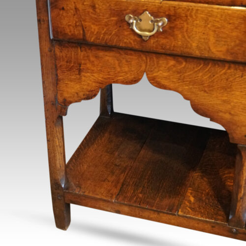 Antique South Wales oak dresser base drawers end top drawer front legs shaped arch