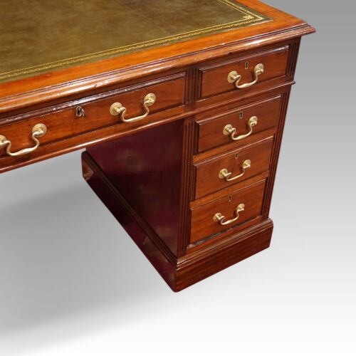 Edwardian mahogany pedestal desk 122cms angle