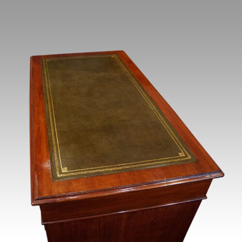 Edwardian mahogany pedestal desk 122cms end top