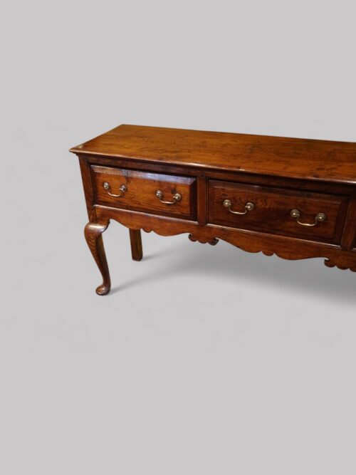 Antique oak cabriole leg dresser base detail