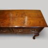 Antique oak cabriole leg dresser base top detail