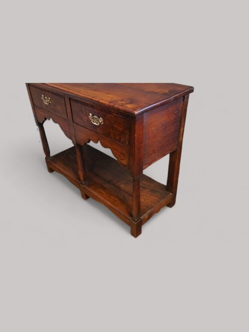 Antique oak cottage dresser base at angle