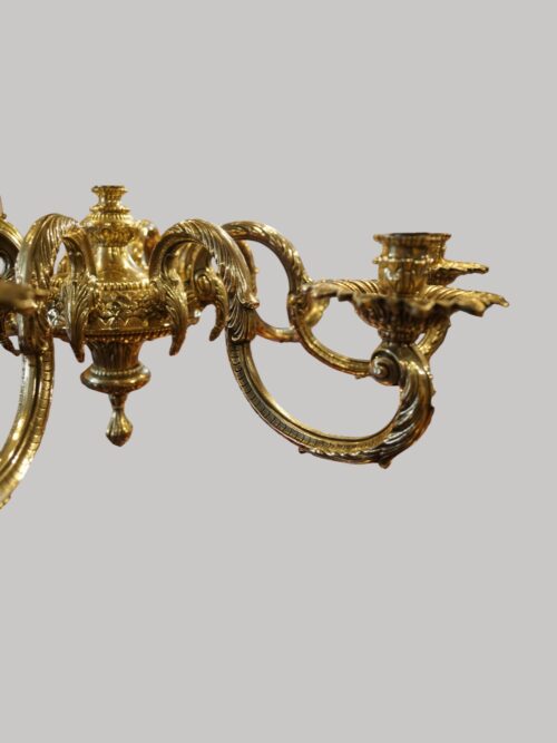 Cast brass 8 arm chandelier body detail