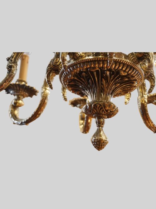 Cast brass 8 arm chandelier underside