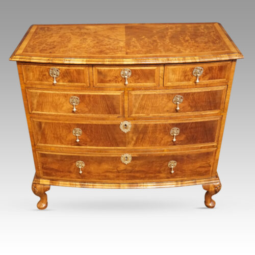 Queen Anne style walnut bow chest