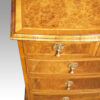 Queen Anne style walnut bow chest corner